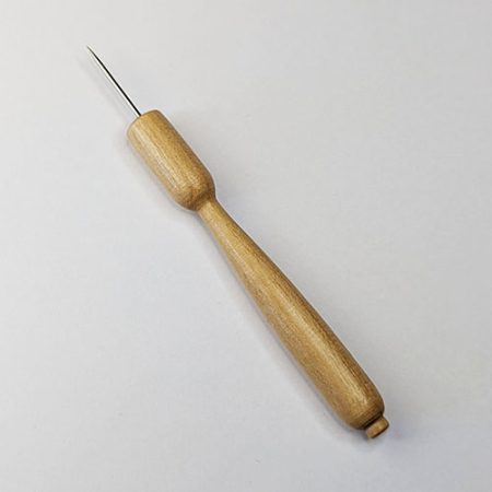 4" wooden handle, rounded at the end and thicker where the pointed needle attaches.