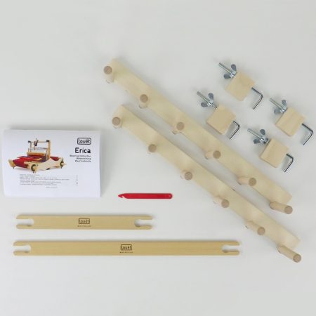 Pack consists of a warping board (2 pieces with 4 clamps), 1 19.5" and 1 11.5" flat shuttles, and a texsolv reed/heddle hook.