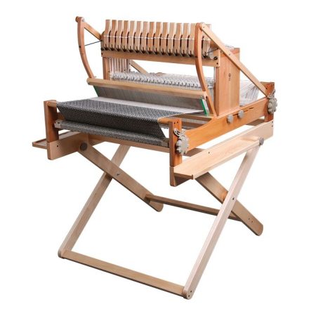 This is a 24" width loom, the 32" loom has more space on each side of the shaft toggles.